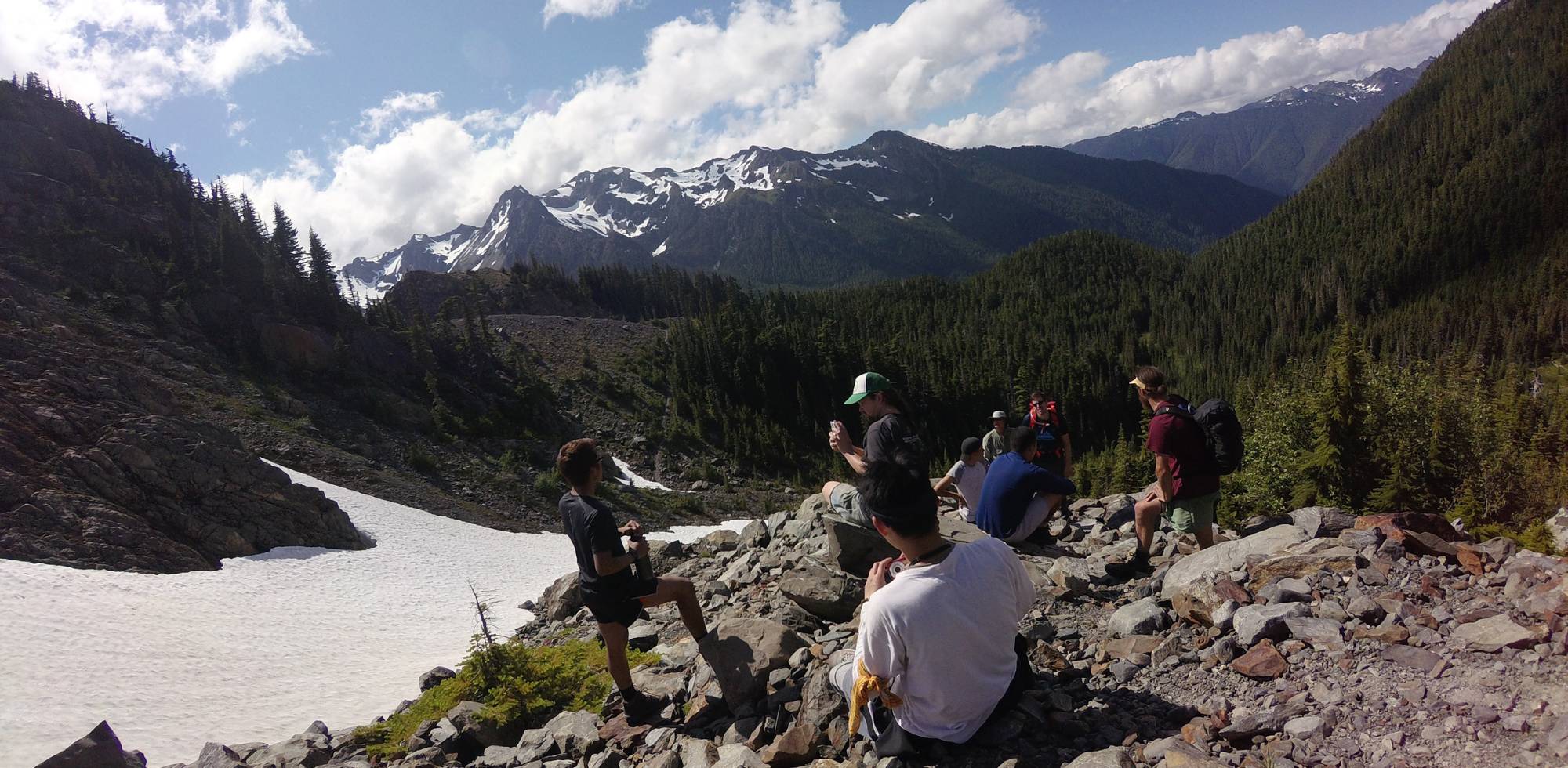 Group on a hike stopping for a rest